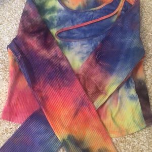 This tie dye long sleeve crop top is from love j and is a size s.
